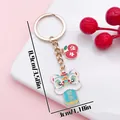 Traditional Chinese lion dance keychain charm with health and peace blessing symbols - Peace and Health Lion Dance (ER2155) / 3x8.9cm / Green