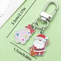 Detail view of the Christmas keychain with dimensions: 5.5cm length and 1.7cm width. - Gifting Santa & Christmas Tree (ER844)