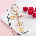 Traditional Chinese lion dance keychain with blessing charm and flower ornament 8.8cm - Blessing Sakura Lion Dance (ER2145) / 3x8.8cm / Yellow