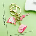 Pink western cowboy keychain set with hat bandana and pistol charms for bag decoration - Pink Enamel Hat Pistol (ER1257)