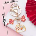 Cartoon Chinese zodiac horse keychain in gold-toned alloy with festive New Year charms - Chinese Knot Lucky Horse (ER2124) / 3x7.3cm (12.8g)