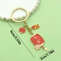 Elegante llavero dorado de estilo chino con linterna roja y amuleto de bendición - Linterna de Paz (ER889)