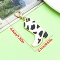 Western style cow print pattern cowboy boot keychain bag charm with golden lobster clasp - Cow Print Western Cowboy Boot Lobster Clasp Pendant (ER2291) / 2.1x4.4cm (2.2g) / Black and White