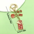 Llavero de la suerte tradicional chino con colgantes de esmalte rojo de caqui y bendiciones - Todo va Bien (ER894)