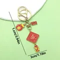 Llavero tradicional chino rojo y dorado con amuletos de la suerte, longitud de 10 cm - Petardo de la Suerte (ER897)