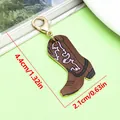 Brown western cowboy boot keychain bag charm with 4.4cm height measurement label. - Wavy Embroidery Pattern Western Cowboy Boot Lobster Clasp Pendant (ER2298) / 2.1x4.4cm (2.1g) / Brown