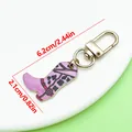 Purple cow print cowboy boot keychain with golden lobster clasp and size marks - Western Cowboy Boot Style (ER2278) / 2.1x6.2cm (4.5g) / Purple