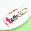 Pink cow print cowboy boot keychain measures 6.2cm by 2.1cm with gold lobster clasp charm - Western Cowboy Boot - Gate Clasp (ER2283) / 2.1x6.2cm / 4.5g Pack / Rose Red