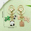 Schattige panda bamboe metalen sleutelhanger met afmetingen voor tasdecoratie - Vredesteken Panda (ER1206)
