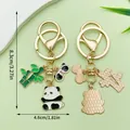 Schattige emaille panda en bamboe metalen sleutelhanger met maataanduidingen. - Baby Panda (ER1210)