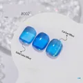 Translucent blue candy glass gel nail polish showing solid and cat eye effects. - No.02