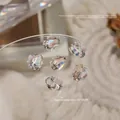 Champagnerfarbener, eis-transparenter ovaler Kristall-Nagelkunst-Anhänger mit Rose - Oval Champagner