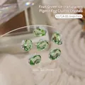 Grüner ovaler Taubenei-Kristall-Nagelschmuck mit Blumen- und Perlenakzenten für Maniküre - Oval Fruchtgrün