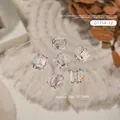 Eistransparenter rechteckiger Nagelkunst-Kristall mit Rosen- und Perlenakzenten, 8x12mm - Rechteck Transparent Gelb