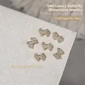 Gold bow nail charms with sparkling zircons for luxury nail art decoration, 6.8x10.3mm - Butterfly Bow Style (G1629) / 1 Piece/Pack (6.8*10.3mm) / Gold
