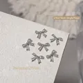 Sparkling silver bow nail charms with rhinestones for luxury 3D manicure nail art decor - Butterfly Bow Style (G1632)