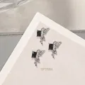 Abalorio para uñas de aleación ala de mariposa plateada con piedra negra rectangular, 13x17mm - Ala de Mariposa Gema Negra Derecha (G1714-16) / Pieza única