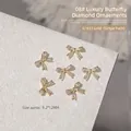 Golden bow-tie nail art charms with sparkle zircon inlays for luxury manicure design - Butterfly Bow Style (G1633)