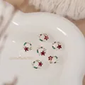 Elegant Christmas wreath nail art charm featuring white pearls and red star rhinestones - Pentagram Red Zirconia Wreath (G1651) / Single Piece