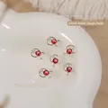 Golden Christmas reindeer wreath nail art charm with red and white zircon, 7x10mm size - Red Zirconia Reindeer Wreath (G1655) / Single Piece