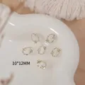Gold-plated Christmas wreath nail art charm with sparkling zircons and flower detail, 10x12mm. - Pave White Zirconia Wreath (G1658) / Single Piece