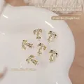 Luxury Christmas gold bell and bow nail art charms with sparkling zircon inlay for manicure - Gold Bow Pendant Bell (G1660) / Single Piece