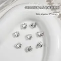 Exquisite 9x10mm heart-shaped silver nail art rhinestones with pearls for manicure - Crooked Heart Style (G-1395)