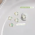 Iridescent pale yellow star-shaped nail art charm made of K9 crystal, size 10x10mm - Large Star (5236582938963) / Single Piece / Light Yellow