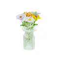 Handgefertigte bunte Glasblumen in einer kleinen geriffelten Glasvase zur Dekoration. - Sieben Kleine Blumen (Stil B)