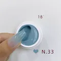 Blue gradient nail art gel polish variant color N.33 in a white jar - No.33