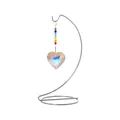 Heart-shaped crystal suncatcher pendant hanging on a silver metal iron display stand - Heart-shaped Pendant / Silver