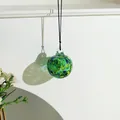Adorno artesanal de bola de cristal soplado moteado verde y amarillo con cordón negro - Bola-Amarillo Verde
