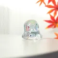 Macro detail showing the iridescent finish on a cute crystal cartoon ghost ornament - Short Ghost Style / 44x43mm / AB Color