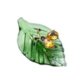Decorative translucent green glass leaf ornament featuring a yellow crystal ladybug insect - Leaf with Bee