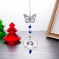 Detail of a decorative crystal suncatcher with a metal butterfly and faceted beads - Ring Pendant / Medium Blue