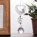 Detailed view of a silver heart filigree pendant with faceted clear crystal ball - Lighting Ball Heart Pendant (30mm)