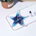 Detailed shot of a blue glass starfish figurine with floral millefiori patterns - Deep Blue Starfish (LSL089) / 12x12x4cm