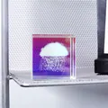 Macro detail of 3D laser engraved cloud and rain design within a K9 crystal glass cube. - Rain / 4x4x4cm