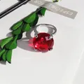 Close-up of a large faceted red crystal set in a silver-tone ring for decor. - 20mm Napkin Ring / Red