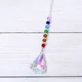 Close-up of a sparkling rainbow crystal suncatcher pendant with iridescent AB coating - Christmas Tree Style
