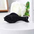 Detailed macro shot of a black polished glass fish figurine ornament for home decor - 70mm Fish / Black