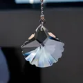 Macro detail of a multi-faceted crystal shell pendant for decorative ceiling fan pull chains - 50mm Scallop (50cm Chain) / Clear