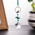 Crystal hanging suncatcher ornament with green beads and a decorative flower pendant. - Plum Blossom Pendant / Colorful