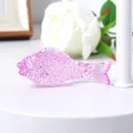Detailed view of pink translucent crystal fish figurine with delicate scale texture - 70mm Fish / Pink