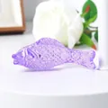 Macro detail of a purple crystal fish figurine showing intricate scale patterns - 70mm Fish / Purple