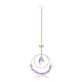 Detailed view of suncatcher with lotus charm, purple chips, and iridescent crystal - Light Purple Stone Style