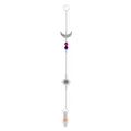 Close-up of silver suncatcher with moon and sun charms, red and blue beads, and crystal prism - Double Pointed
