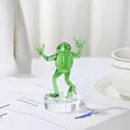 Detailed view of a green glass frog figurine standing on a clear circular crystal base - Kung Fu Frog with Base Half Raised Hands