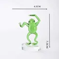 Dimension view of a green glass kung fu frog figurine, height 7.5cm and width 4.5cm - Kung Fu Frog with Base Bent Hands