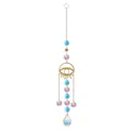 Macro detail of a golden evil eye sun catcher featuring iridescent crystal prisms and waterdrop pendant - Eye / Lake Blue